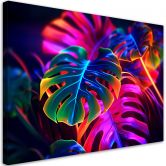 Leinwandbild, Monstera-Blätter in fluoreszierenden Farben 