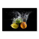 Glasbild Mogyorosi - Fruchtige Spritzer von Zitrusfrüchten 