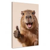 Leinwandbild Happy Capybara mit Daumen hoch 