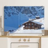Spritzschutz Ferienhütte in den Schweizer Alpen 
