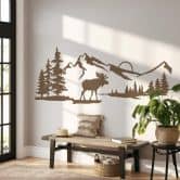 Wallsticker Elg ved solnedgang i et bjerglandskab 
