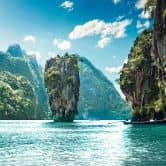 Fototapete Berge ThailandIsland in türkis grün - Vliestapete Designwalls 2 - 2,55 x 3,5 m 