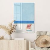 Glasbild Sommer - Liegestuhl mit Blick aufs Meer - Rivers 