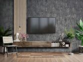 Vliesbehang met licht metallic effect als effen zwarte textuur 