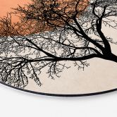 Tableau sur alu-Dibond rond Matin d'hiver en couleur pêche - Kubistika 