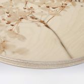 Tableau sur bois rond 1X Studio - branche aux fleurs délicates 