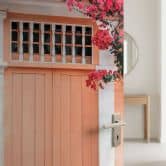 Door foil Peach-colored facade in South America - Hugonnard - Self-adhesive door decoration 